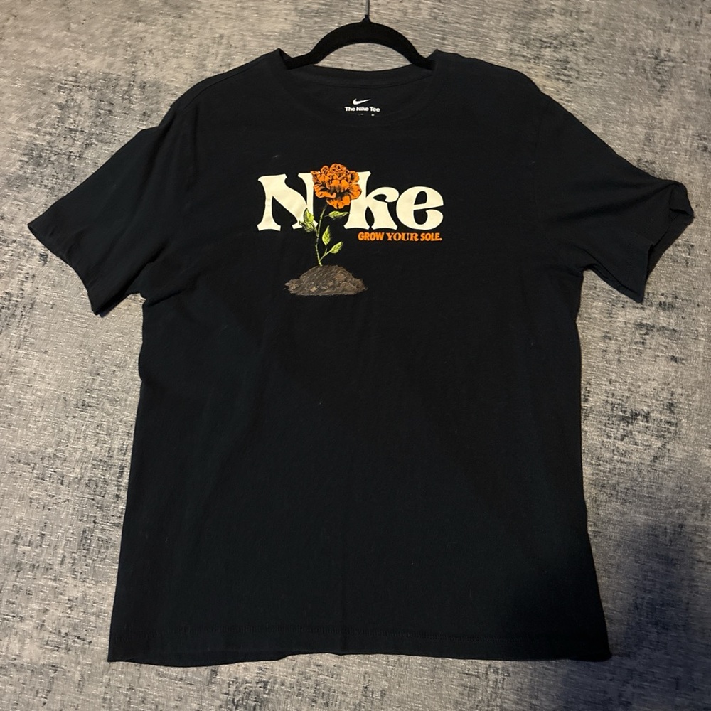 Nike Black Short-Sleeve Tee with Orange Floral Logo